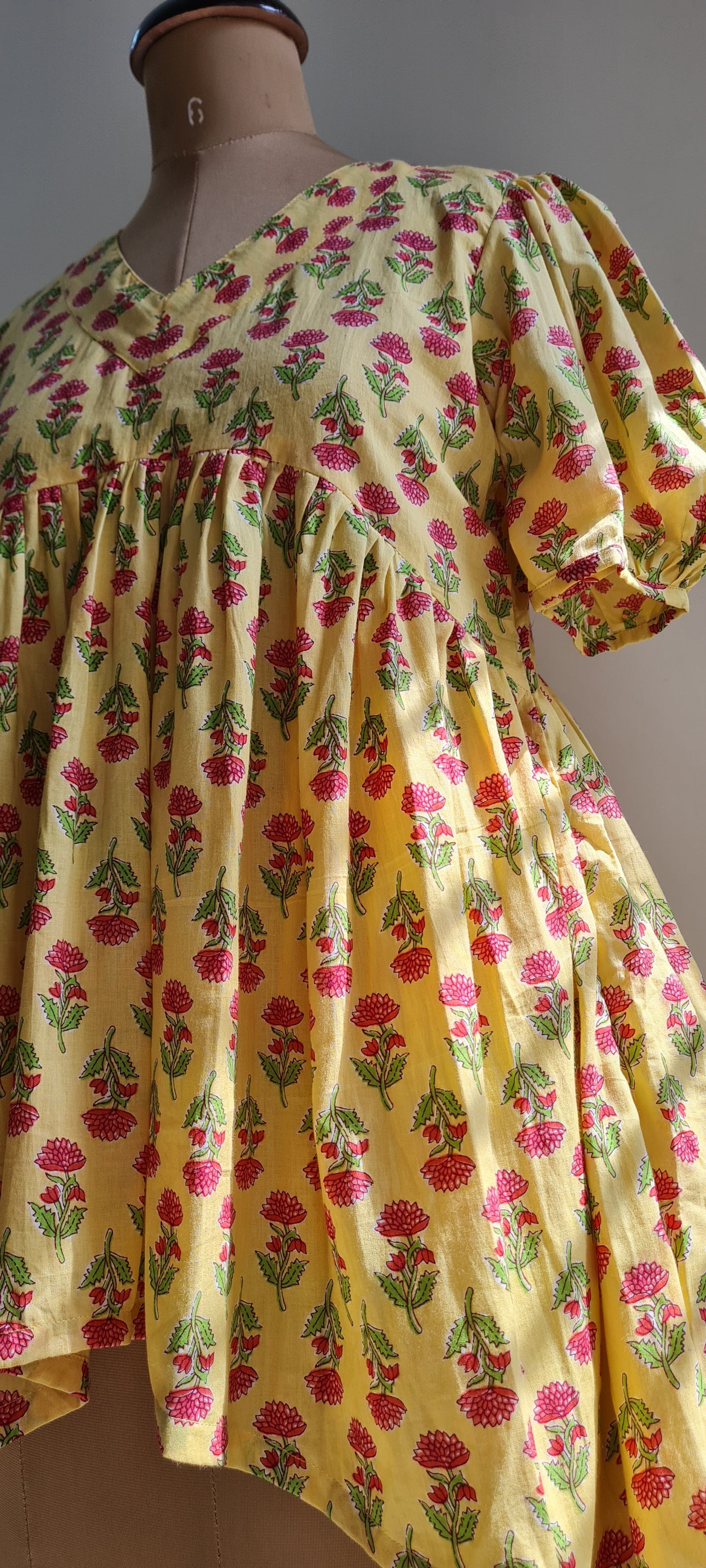 Pink And Yellow Peplum Top