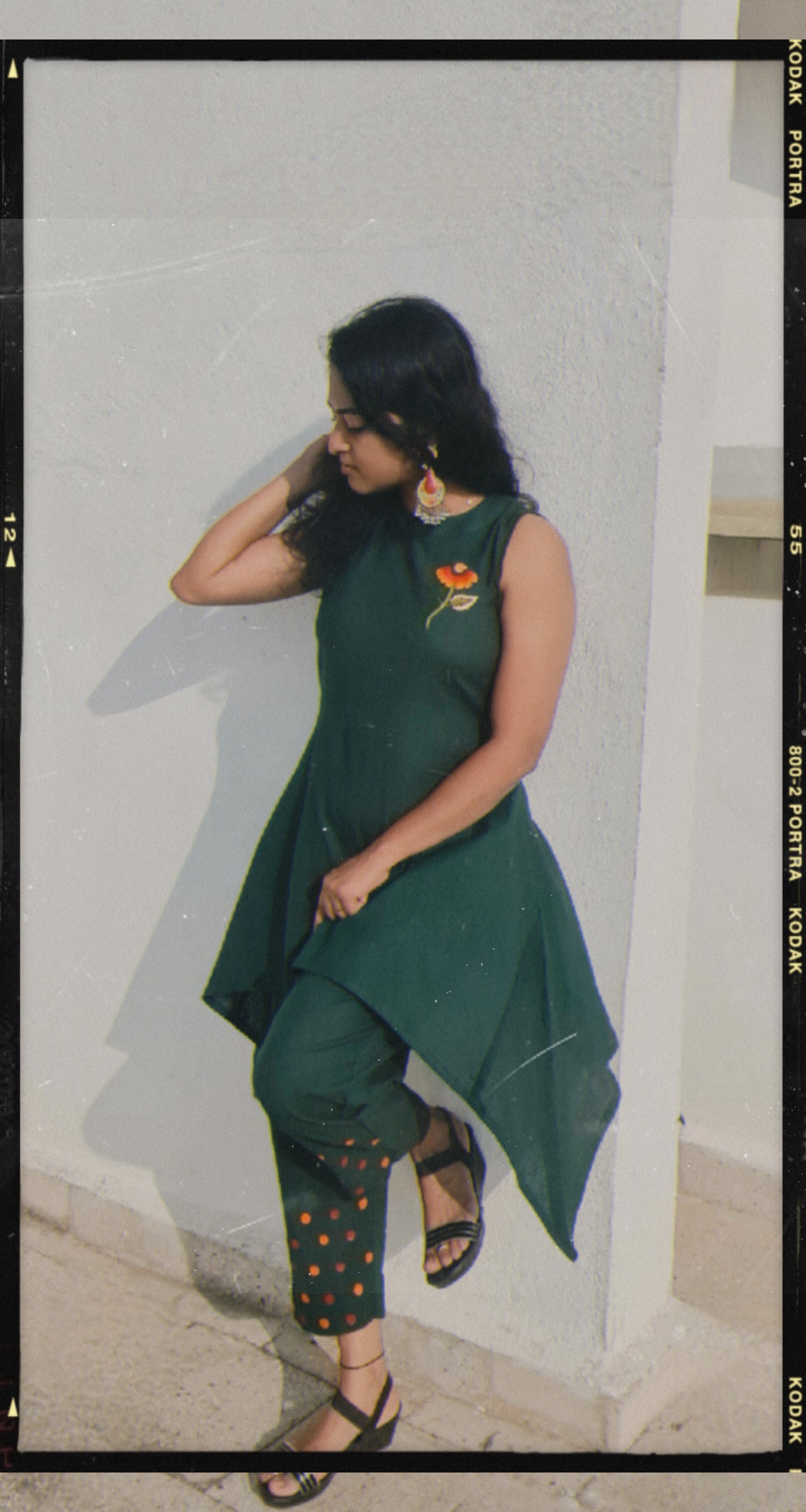 Emerald Bloom: Hand-Embroidered Halter Kurti And Bottom with Artful Accents