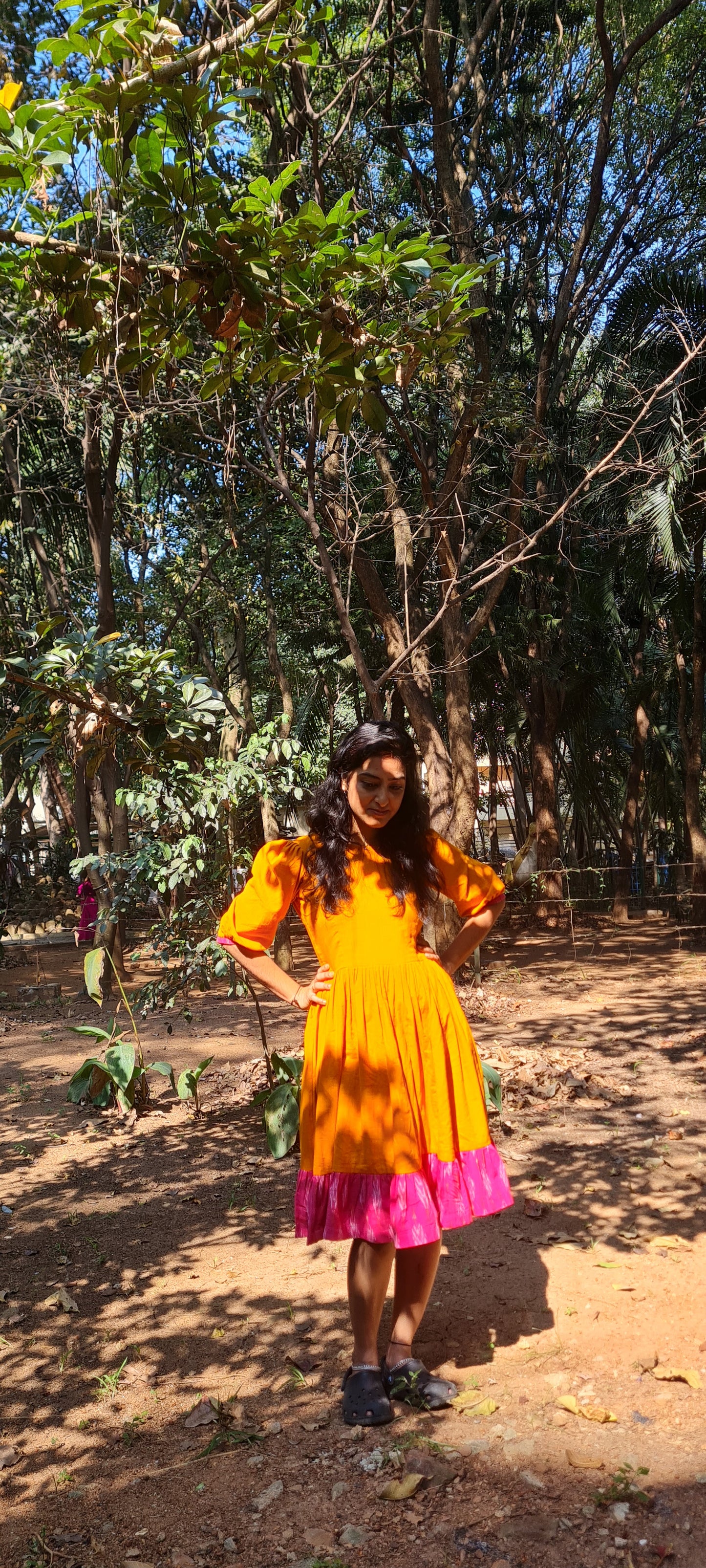 Radiant Elegance: The Orange Cotton Frock with Ikat Frills