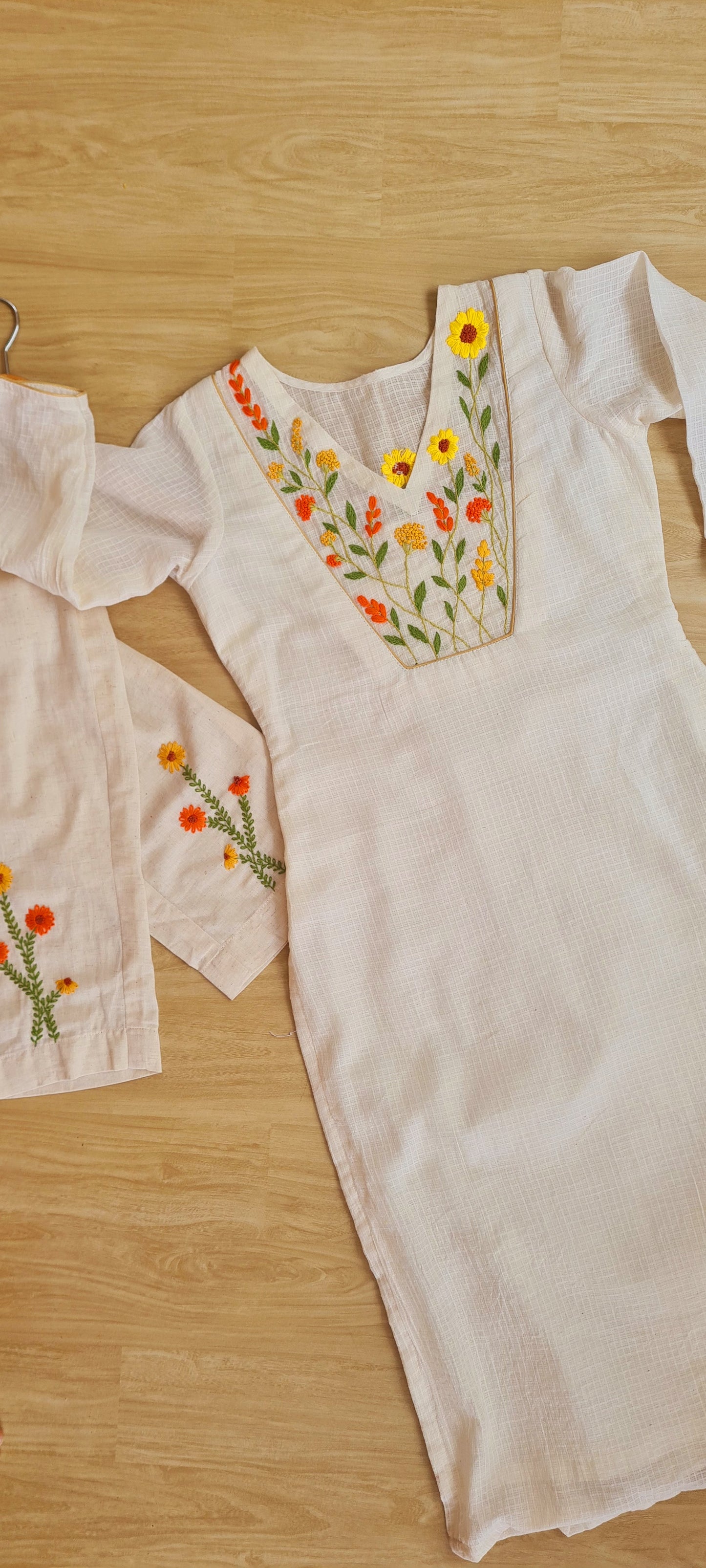 Marigold Meadow: Hand-Embroidered Onam Kurti Set