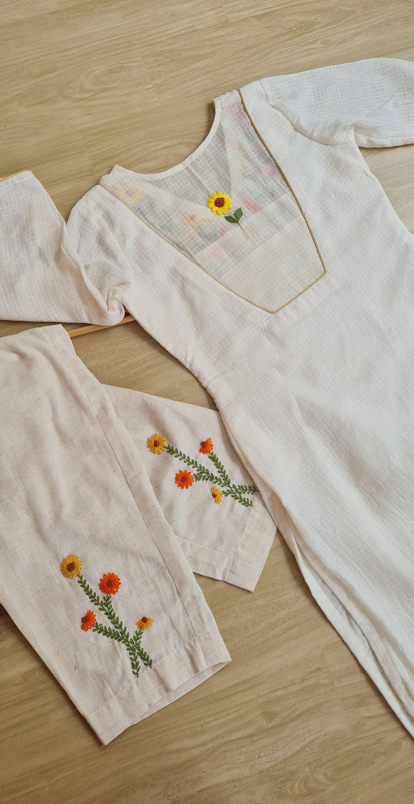 Marigold Meadow: Hand-Embroidered Onam Kurti Set