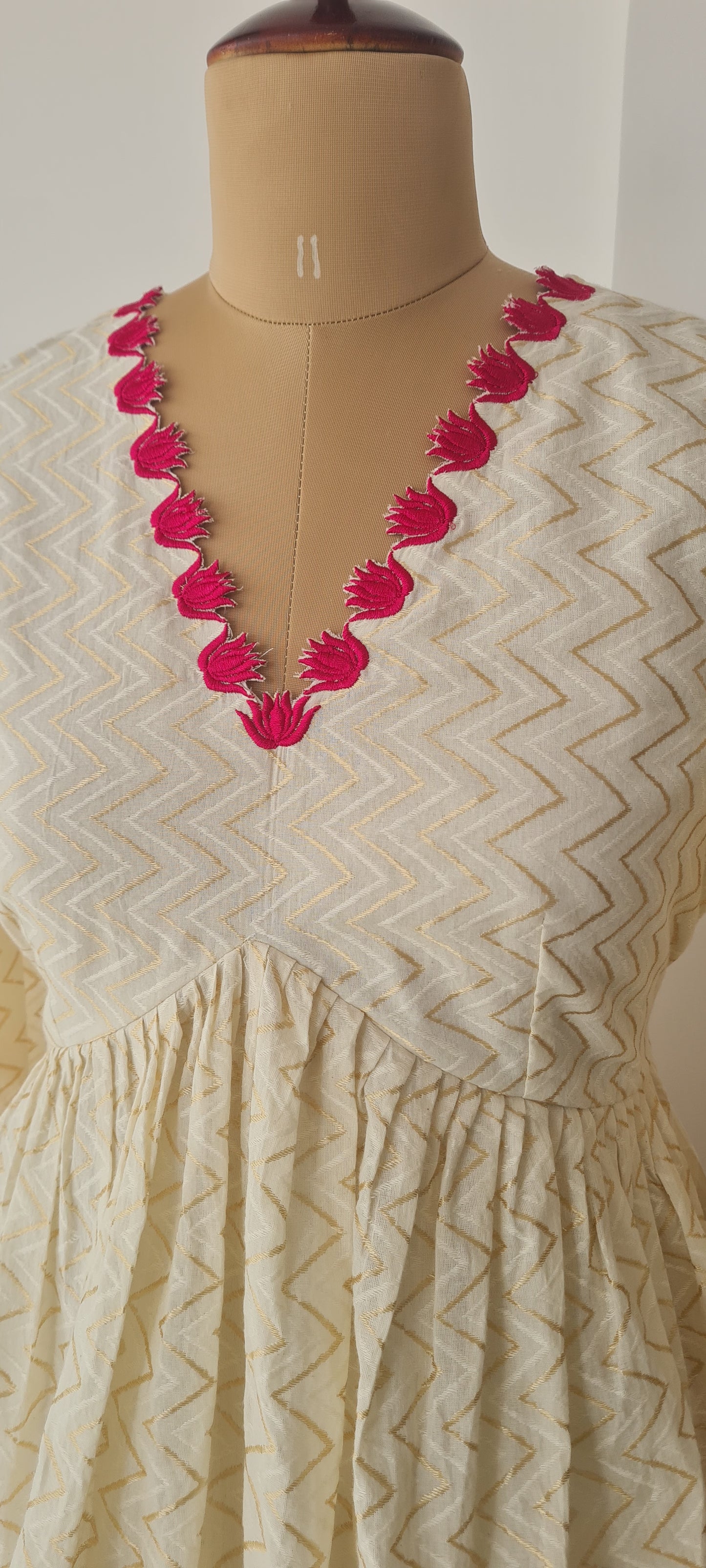 Off white alia cut lotus cut work frock