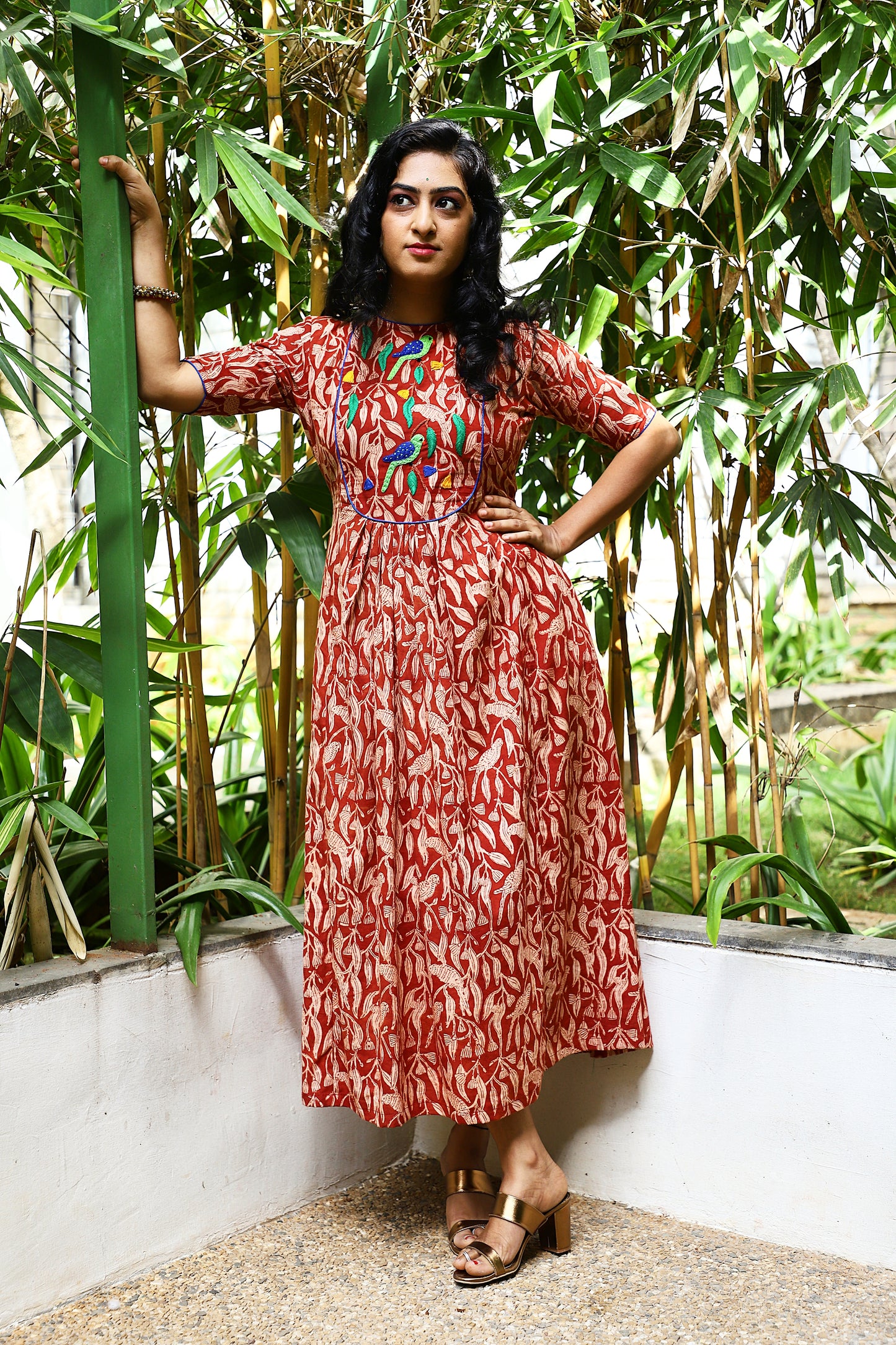 Whispers of Elegance: A Parrot-Inspired Tapestry Frock