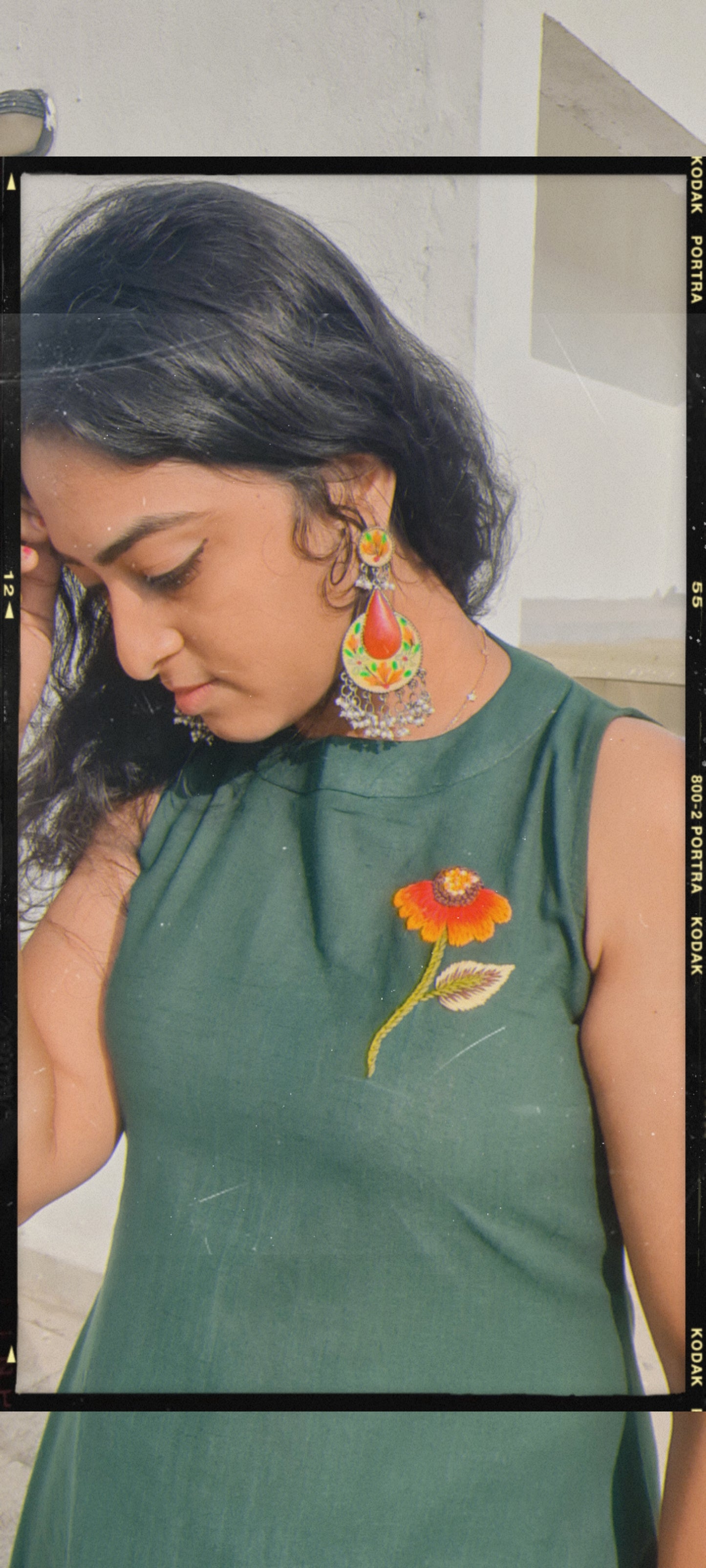 Emerald Bloom: Hand-Embroidered Halter Kurti And Bottom with Artful Accents