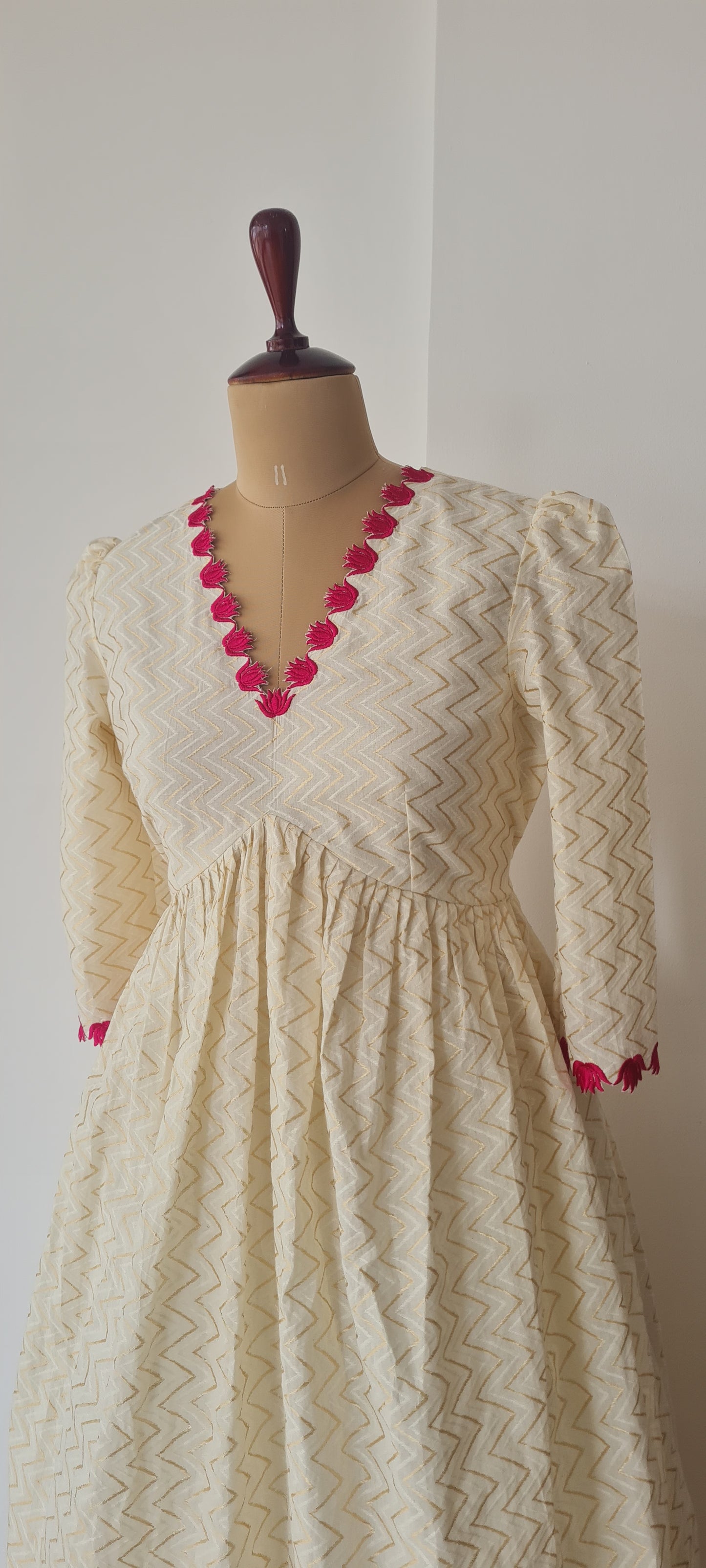 Off white alia cut lotus cut work frock