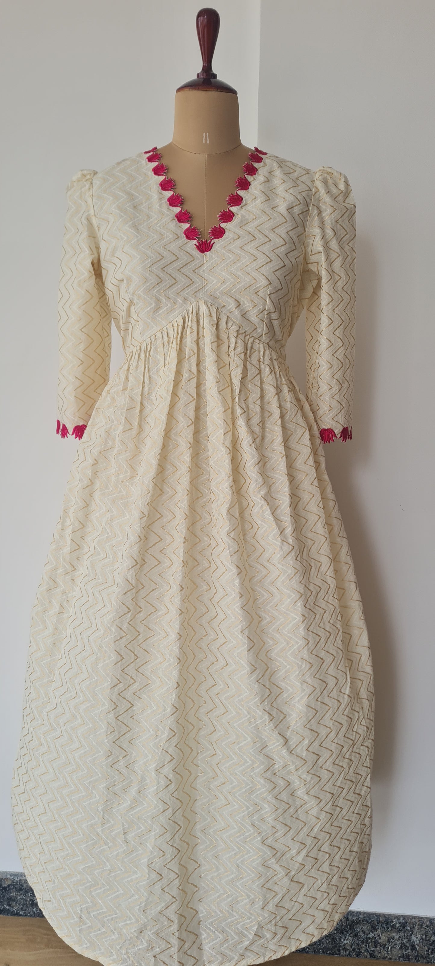 Off white alia cut lotus cut work frock