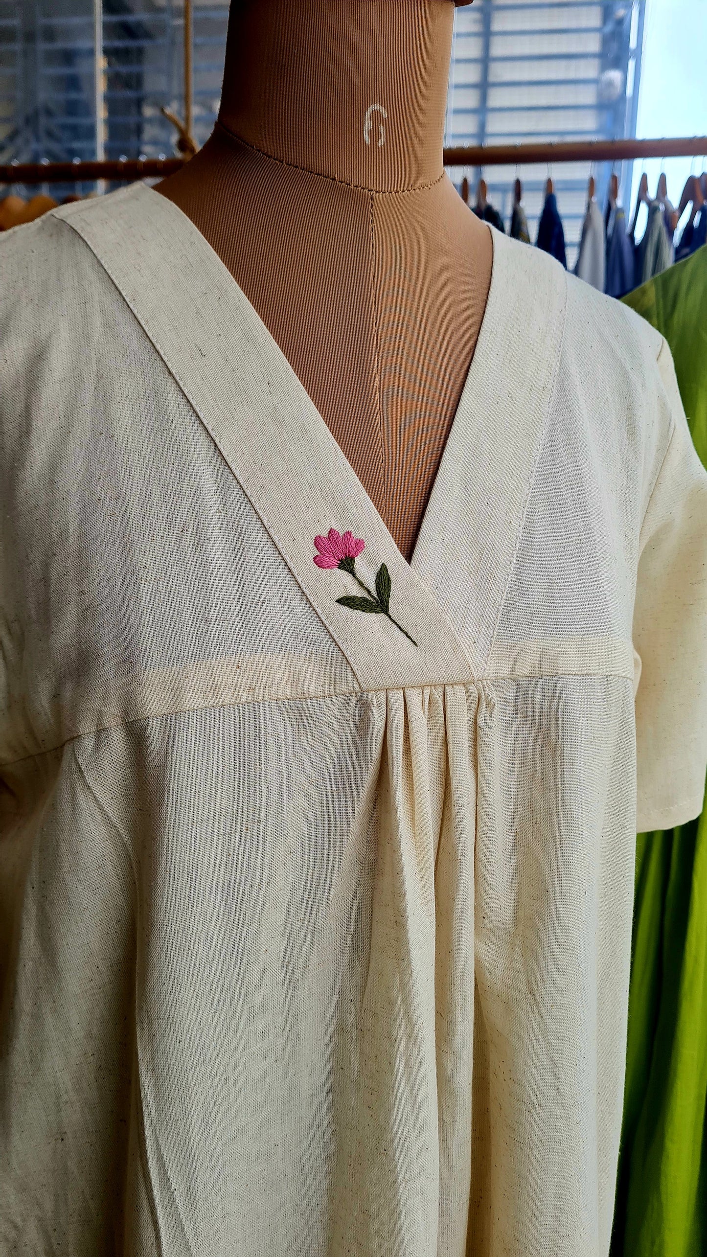 As Simple as that...
Onam Grace: Hand-Embroidered Off-White Cotton Kurti Frock