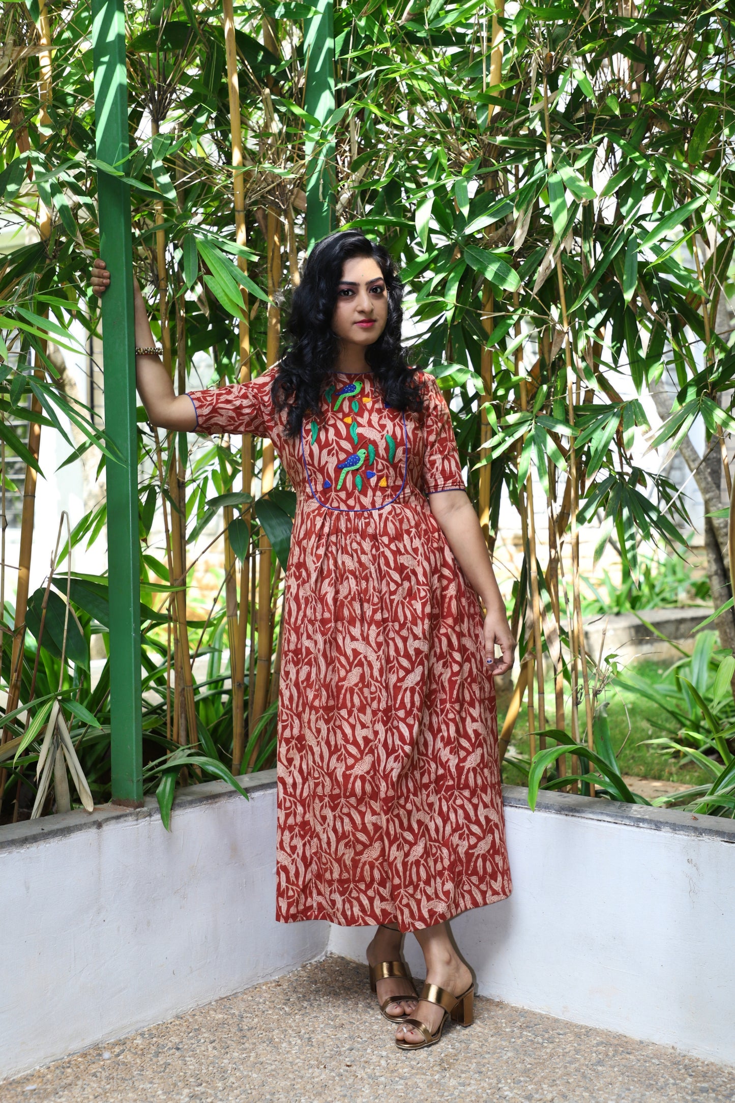 Whispers of Elegance: A Parrot-Inspired Tapestry Frock