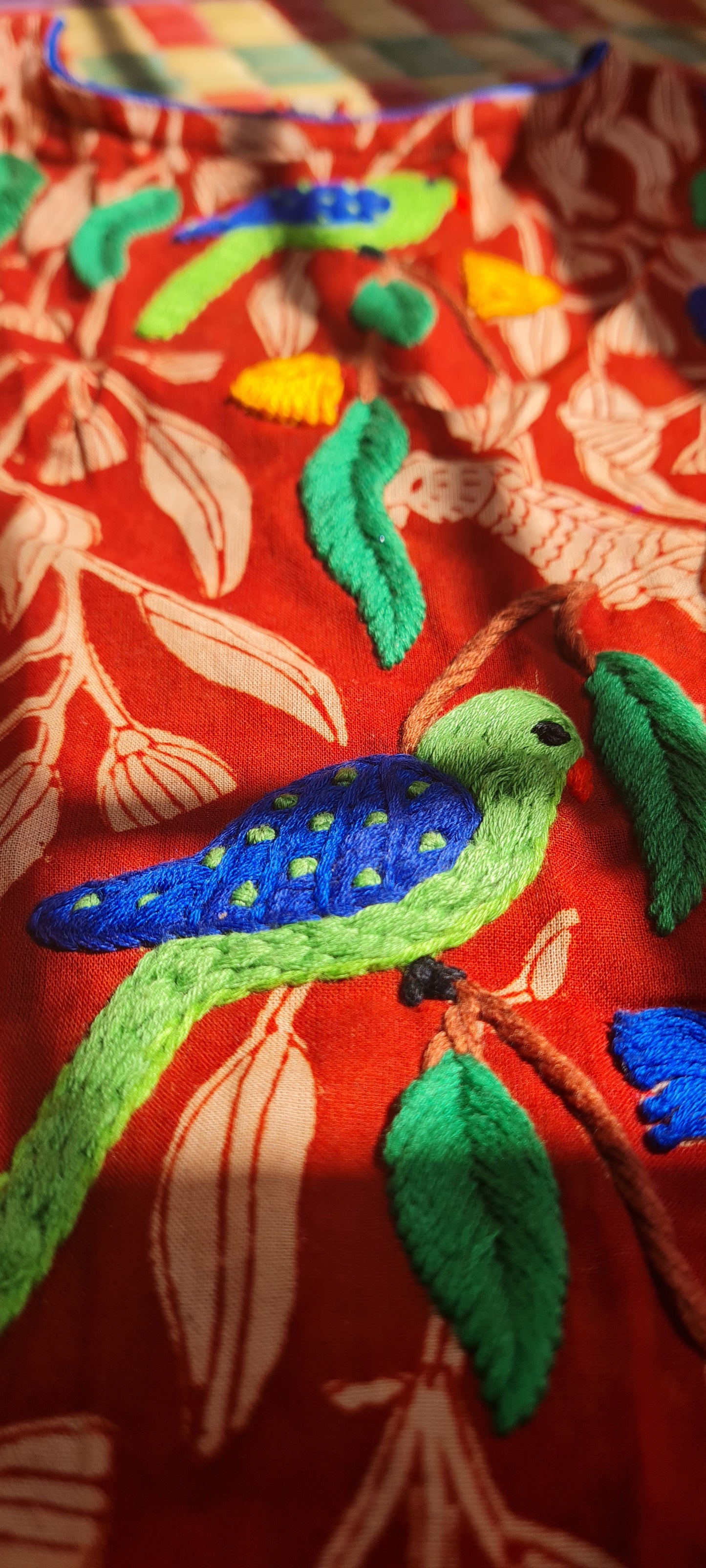 Whispers of Elegance: A Parrot-Inspired Tapestry Frock
