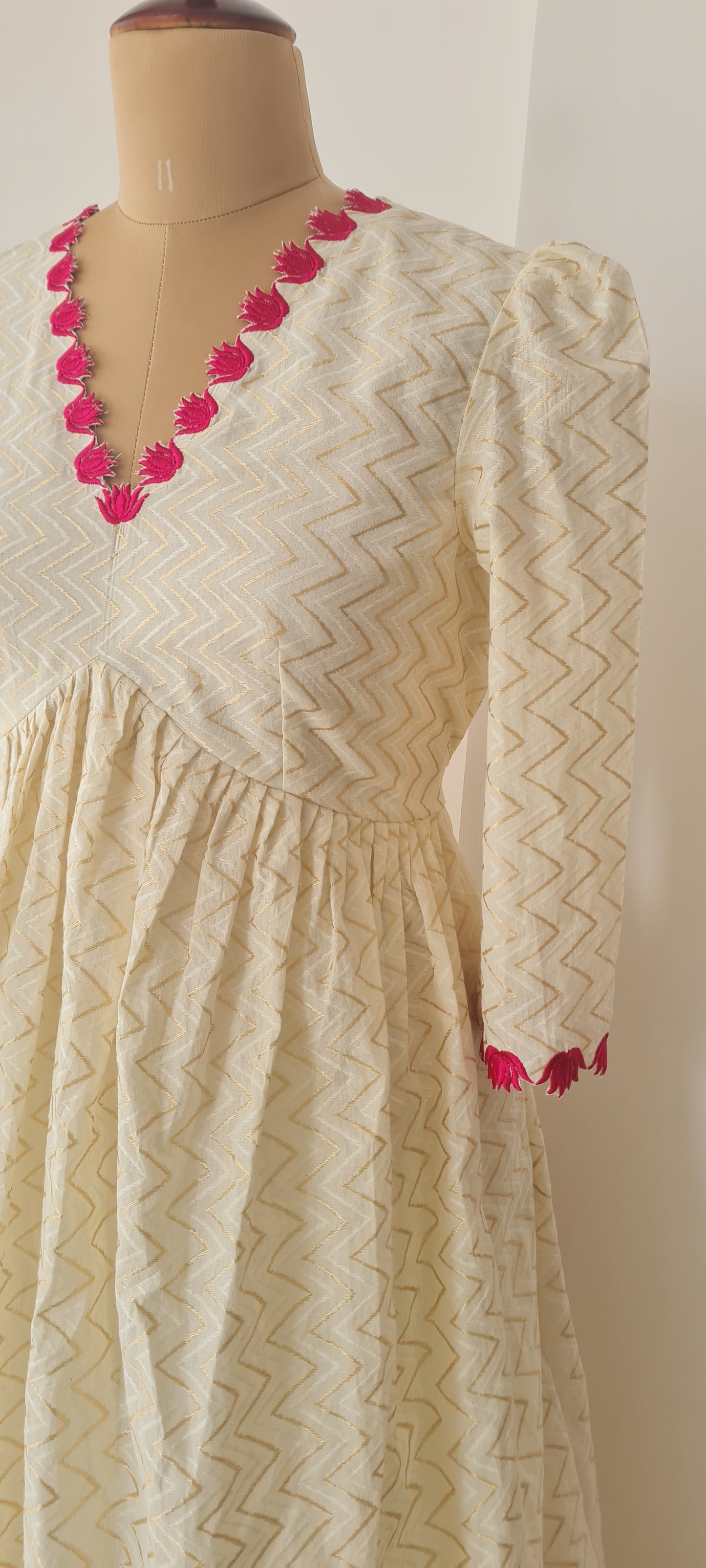 Off white alia cut lotus cut work frock