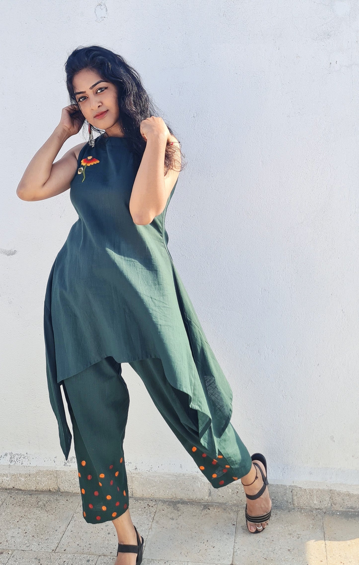 Emerald Bloom: Hand-Embroidered Halter Kurti And Bottom with Artful Accents