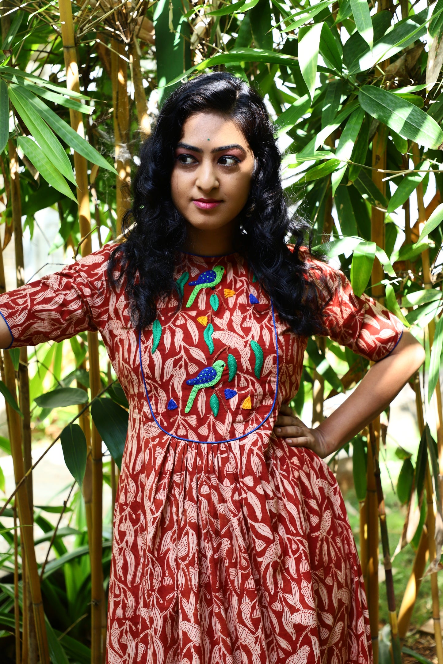 Whispers of Elegance: A Parrot-Inspired Tapestry Frock