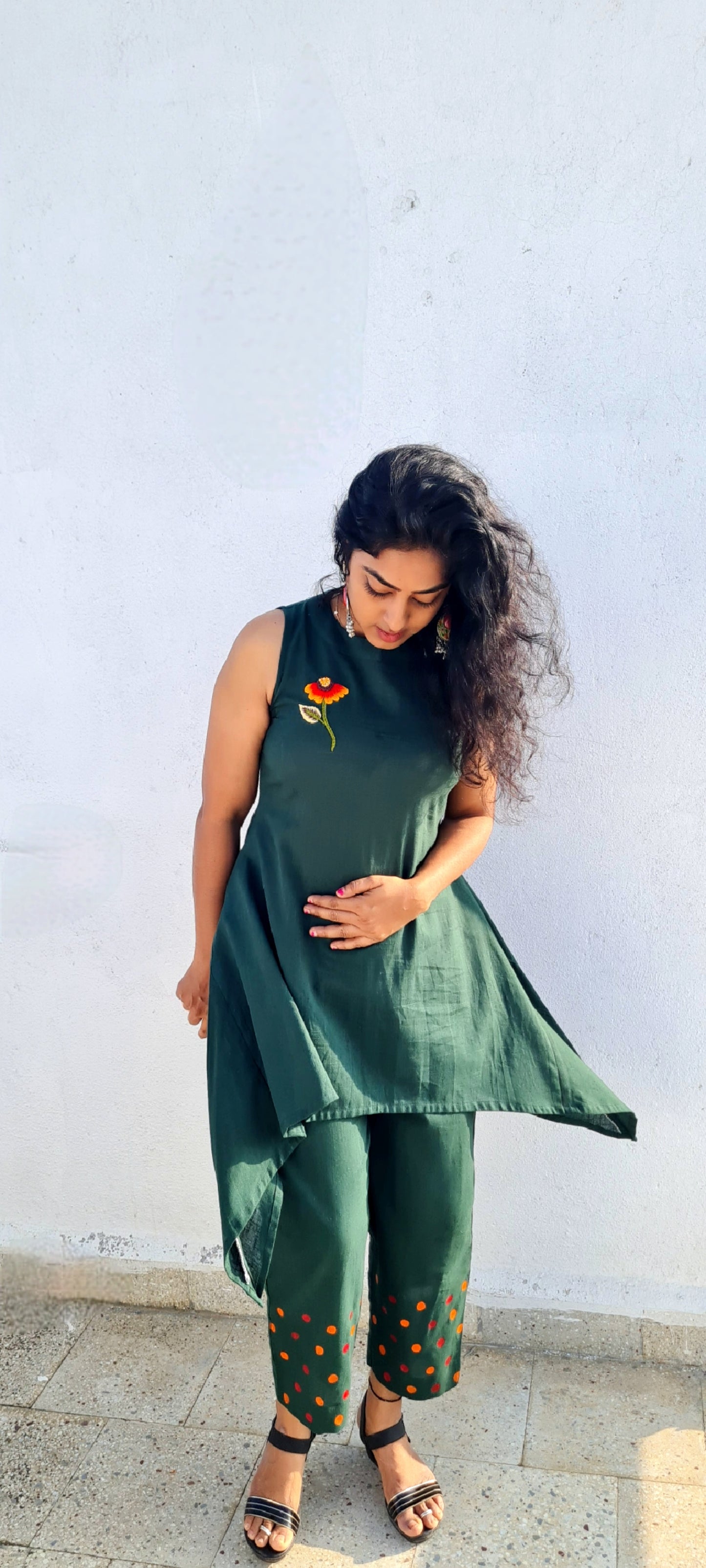 Emerald Bloom: Hand-Embroidered Halter Kurti And Bottom with Artful Accents