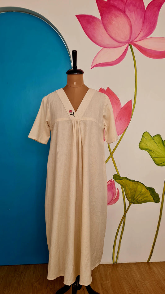 As Simple as that...
Onam Grace: Hand-Embroidered Off-White Cotton Kurti Frock