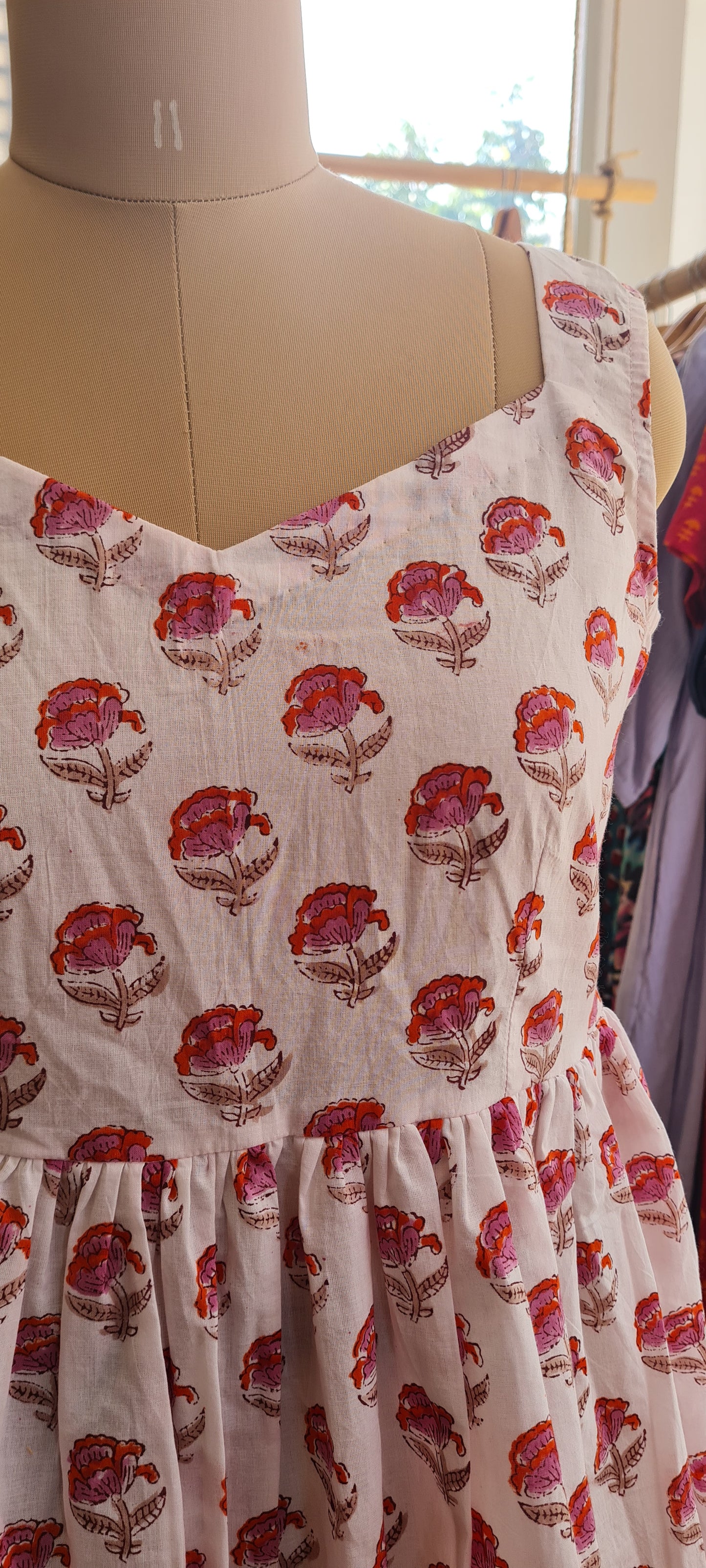 The White Floral Peplum Top