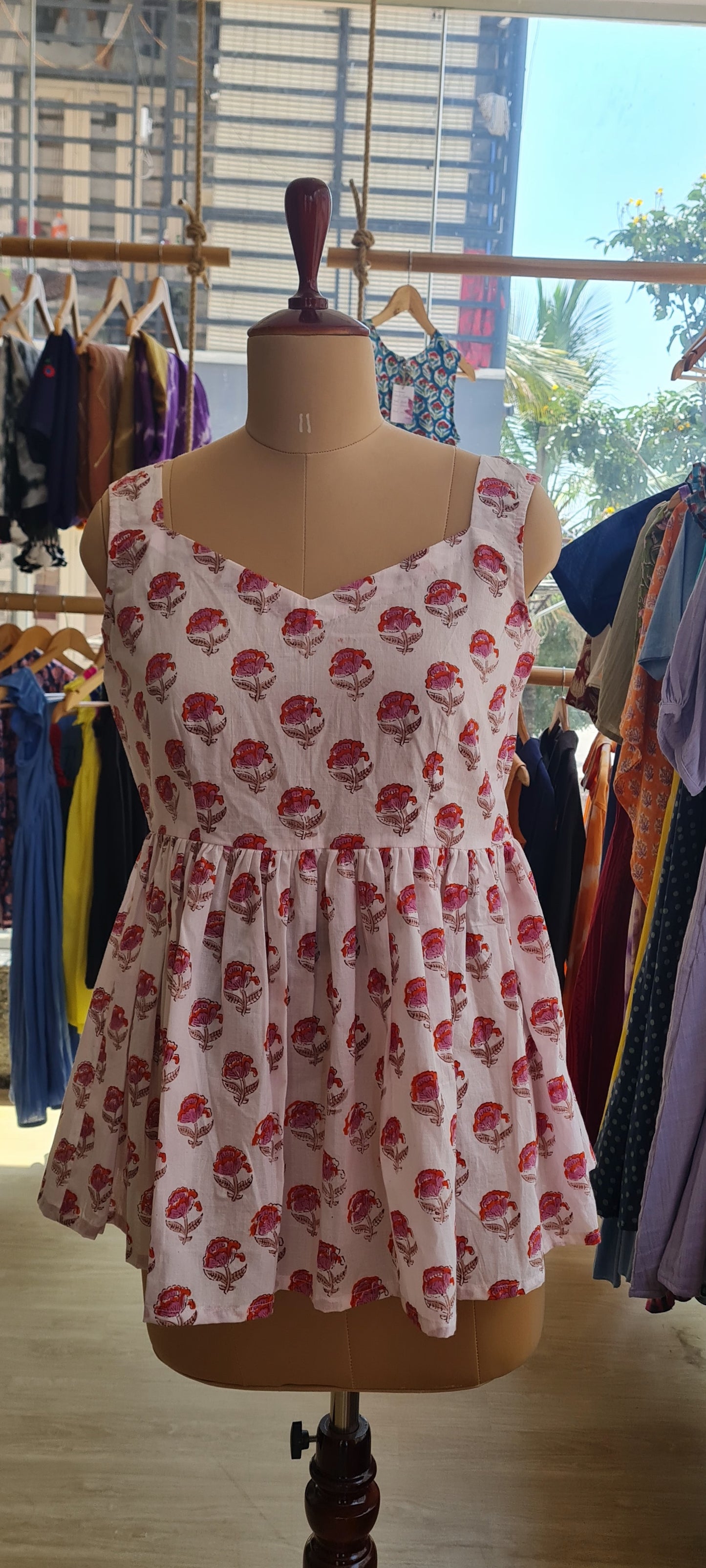 The White Floral Peplum Top