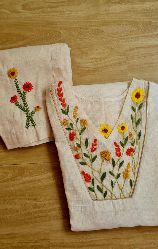 Marigold Meadow: Hand-Embroidered Onam Kurti Set