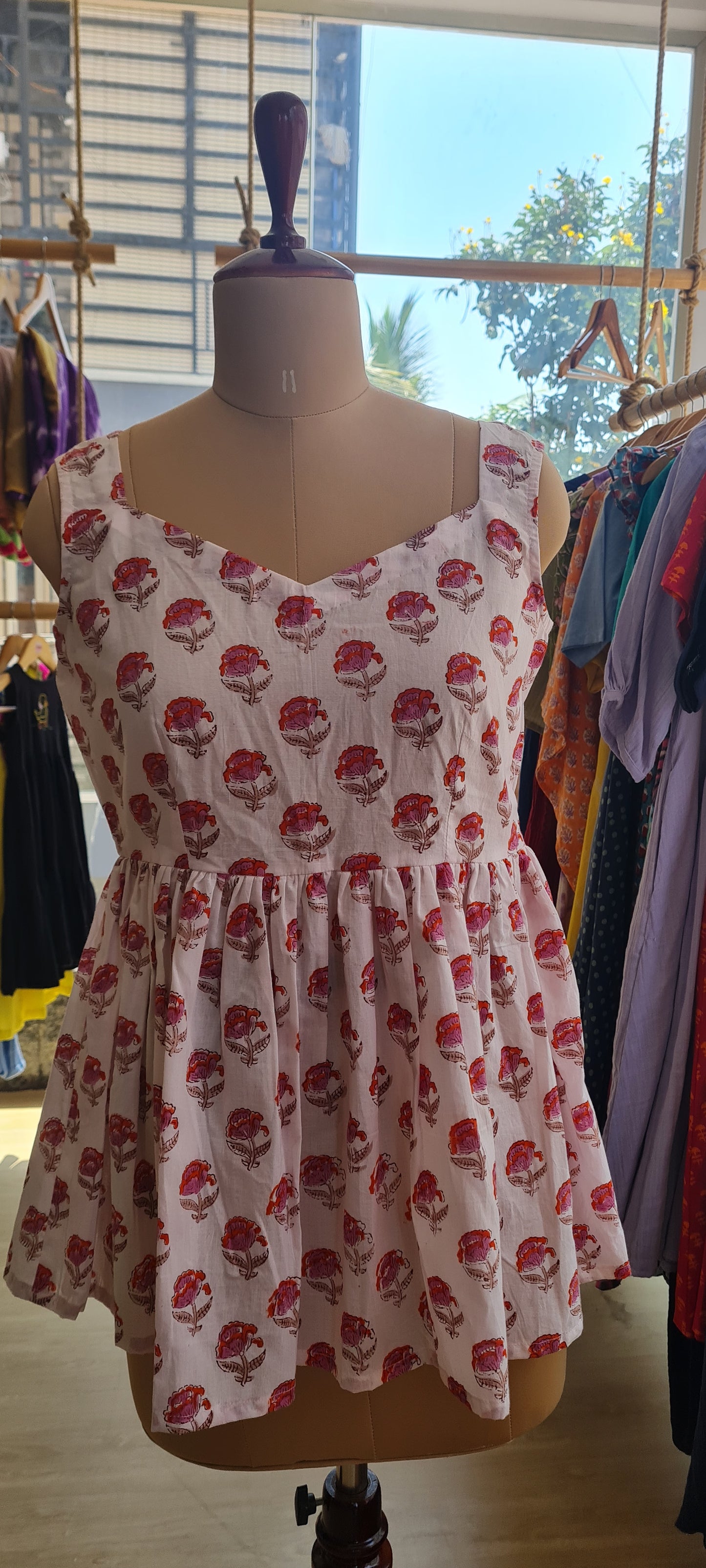 The White Floral Peplum Top
